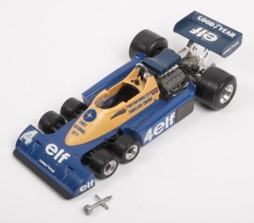TYRRELL: A 1:14 scale Burago Elf Tyrrell 6 wheeler F1 model