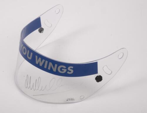 WEBBER: A late 2000s perspex Red Bull racing 'Gives You Wings' helmet visor, signed by Mark Webber in silver. Visor with holographic authentication sticker from P.A.A.S numbered 'MF 012916'