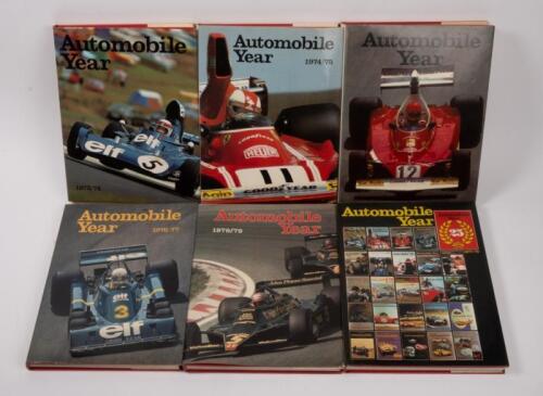 AUTOMOBILE YEAR: A collection of six hardcover 'Automobile Year' books, issues 21-26, with years ranging from 1973-1979.