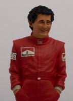 ALAIN PROST: A 1:9 scale limited edition (1154/5000) cold cast porcelain resin figure of Alain Prost&nbsp;sculpted by Paul Szeiler for Endurance Ltd, on wooden base with engraved plaque, NIB and accompanied by a COA from The Art of Sport, 22cm high - 2