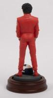 ALAIN PROST: A 1:9 scale limited edition (1154/5000) cold cast porcelain resin figure of Alain Prost&nbsp;sculpted by Paul Szeiler for Endurance Ltd, on wooden base with engraved plaque, NIB and accompanied by a COA from The Art of Sport, 22cm high - 3