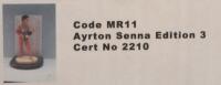 AYRTON SENNA: A 1:9 scale limited edition&nbsp;cold cast porcelain resin figure of Ayrton Senna sculpted by Paul Szeiler for Endurance Ltd, on wooden base with engraved plaque, NIB and accompanied by a COA from The Art of Sport, 22cm high - 6