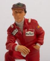 NIKI LAUDA: A 1:9 scale limited edition (0972/5000) cold cast porcelain resin figure of Niki Lauda&nbsp;sculpted by Paul Szeiler for Endurance Ltd, on wooden base with engraved plaque, NIB and accompanied by a COA from The Art of Sport, 22cm high - 2