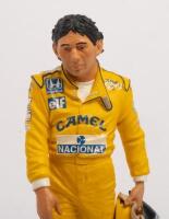 AYRTON SENNA: A 1:9 scale limited edition (3949/5000) cold cast porcelain resin figure of Ayrton Senna&nbsp;sculpted by Paul Szeiler for Endurance Ltd, on wooden base with engraved plaque, NIB and accompanied by a COA from The Art of Sport, 22cm high - 2