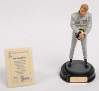 MIKA HAKKINEN: A 1:9 scale limited edition (0563/5000) cold cast porcelain resin figure of Mika Hakkinen&nbsp;sculpted by Paul Szeiler for Endurance Ltd, on wooden base with engraved plaque, NIB and accompanied by a COA from The Art of Sport, 22cm high