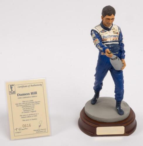 DAMON HILL: A 1:9 scale limited edition (0616/5000) cold cast porcelain resin figure of Damon Hill sculpted by Paul Szeiler for Endurance Ltd, on wooden base with engraved plaque, NIB and accompanied by a COA from The Art of Sport, 22cm high