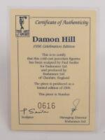 DAMON HILL: A 1:9 scale limited edition (0616/5000) cold cast porcelain resin figure of Damon Hill sculpted by Paul Szeiler for Endurance Ltd, on wooden base with engraved plaque, NIB and accompanied by a COA from The Art of Sport, 22cm high - 4