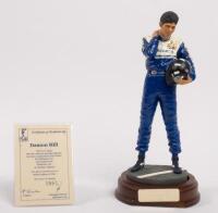 DAMON HILL: A 1:9 scale limited edition (0861/5000) cold cast porcelain resin figure of Damon Hill sculpted by Paul Szeiler for Endurance Ltd, on wooden base with engraved plaque, NIB and accompanied by a COA from The Art of Sport, 22cm high