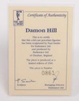 DAMON HILL: A 1:9 scale limited edition (0861/5000) cold cast porcelain resin figure of Damon Hill sculpted by Paul Szeiler for Endurance Ltd, on wooden base with engraved plaque, NIB and accompanied by a COA from The Art of Sport, 22cm high - 4