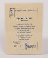 AYRTON SENNA: A 1:9 scale limited edition (0154/5000) cold cast porcelain resin figure of Ayrton Senna&nbsp;sculpted by Paul Szeiler for Endurance Ltd, on wooden base with engraved plaque, NIB and accompanied by a COA from The Art of Sport, 22cm high - 4