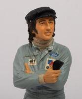 JACKIE STEWART: A 1:9 scale limited edition (0381/5000) cold cast porcelain resin figure of Jackie Stewart&nbsp;sculpted by Paul Szeiler for Endurance Ltd, on wooden base with engraved plaque, NIB and accompanied by a COA from The Art of Sport, 22cm high - 2