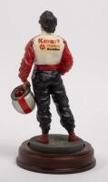 MARIO ANDRETTI: A 1:9 scale limited edition&nbsp;cold cast porcelain resin figure of Mario Andretti&nbsp;sculpted by Paul Szeiler for Endurance Ltd, on wooden base with engraved plaque,&nbsp;22cm high - 3