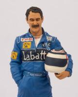 NIGEL MANSELL: A 1:9 scale limited edition (1403/5000) cold cast porcelain resin figure of Nigel Mansell&nbsp;sculpted by Paul Szeiler for Endurance Ltd, on wooden base with engraved plaque, NIB and accompanied by a COA from The Art of Sport, 22cm high - 2