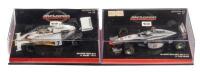 McLAREN M23 MP 4/12: A pair of McLaren formula 1 models, an Ford M23, the number 7 car as driven by Denny Hulme in 1973, manufactured by Minichamps, product number 530 734307, also a Mercedes MP 4/12, the number 10 car as driven by David Coulthard in 1997