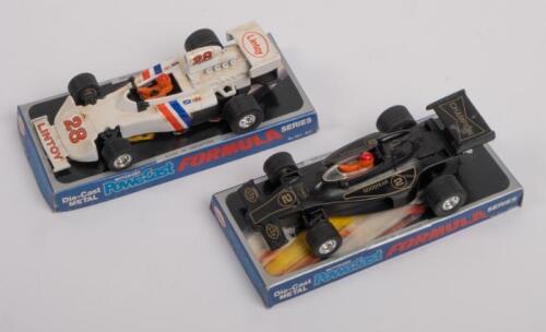 FORMULA SERIES: Two Lintoy Singapore Formula Series diecast powa-cast pull back action models in original plastic bubble packaging