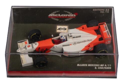 McLAREN MERCEDES MP 4/11: A 1:43 scale Minichamps McLaren Mercedes MP 4/11 as raced by David Coulthard in 1996