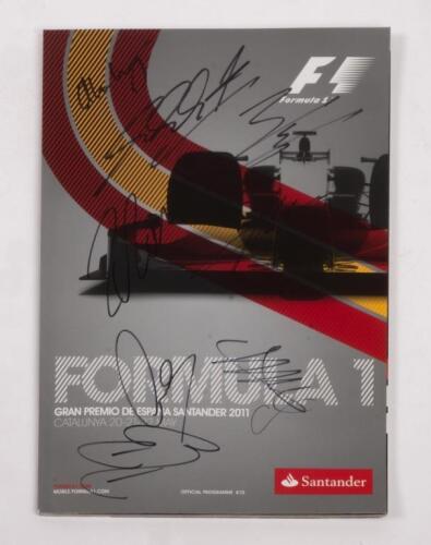 SPANISH: A autographed Formula 1 race programme from the 2011 Spanish GP Catalunya, signatures include, Michael Schumacher, Lewis Hamilton, Sebastian Vettel and 16 other drivers.