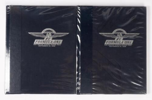 INDIANAPOLIS: A autographed SAP United States Grand Prix At Indianapolis commemorative programme, inside cover signed, Michael Schumacher, Jenson Button and others.