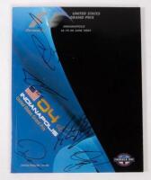 USA: A autographed Formula 1 race programme&nbsp;from the 2004 USA GP Indianapolis,&nbsp;signed by, Michael Schumacher, Kimi Raikkonen, Jenson Button and 5&nbsp;other drivers.