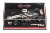 McLAREN MERCEDES MP 4/14: A 1:43 scale Minichamps McLaren Mercedes MP 4/14 as raced by Mika Hakkinen in 1999