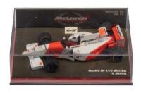 McLAREN MP 4/10 MERCEDES: A 1:43 scale Minichamps McLaren MP 4/10 Mercedes, as raced by Nigel Mansell in 1995