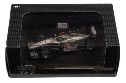 McLAREN MP 4-15: A 1:43 scale Hot Wheels Racing McLaren MP 4-15, as raced by David Coulthard