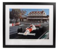 NIKI LAUDA: A limited edition print after Eric Irvine commemorating "Niki Lauda's last race, the 1985 Australian Grand Prix" , numbered 65/1000, framed and glazed, 53cm high, 62cm wide overall.