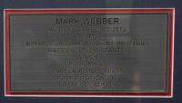 WEBBER:&nbsp;A box&nbsp;framed &&nbsp;collage relating to successful F1&nbsp;driver Mark Webber, including OMP racing glove with Mark Webber&nbsp;signature surrounded by four photographs and plaque. Measures 84.5cm wide, 59cm high. - 4