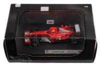 FERRARI F2003-GA: A 1:43 scale Hot Wheels Racing Ferrari F2003-GA, as raced by Michael Schumacher