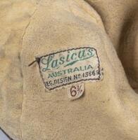 AVIATION HELMET: A early 20th century leather aviation flying helmet by Lasicas Australia, size 6 & 3/4, inside marked with 'W.Davidson 438700' in black ink. - 3