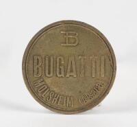 BUGATTI BRASS DISC: A 'Bugatti Molsheim&nbsp;(Alsace) brass disc, 4cm wide