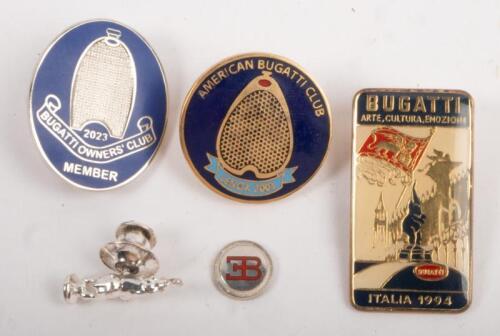 BUGATTI LAPEL PINS: A collections of Bugatti lapel pins, a Bugatti Italia 1994 pin, American Bugatti Club pin, Bugatti Owners Club Member 2023 pin and a Bugatti Royale pendant