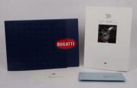 BUGATTI: Two publications relating to Bugatti, a beautifully&nbsp;presented brochure booklet with picture cards and CD, detailing Bugatti model history up to present day and also the Ettore Bugatti International Magazine of Automobiles and Other Art Objects, 2