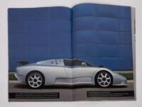 BUGATTI EB 110: A few items relating to the EB 110 Bugatti model, a large pictorial book showcasing the EB110 model & variants plus also a laminated small poster of the 14 September 1991 Le Reveil Bugatti - Premiere Mondiale De La Nouvelle Grand Tourisme - 4