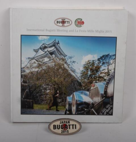 BUGATTI: A comprehensive hardbound pictorial book commemorating the 'International Bugatti Meeting and Le Festa Mille Miglia 2015 in Japan' and also an accompanying grille badge to same event