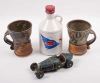 BUGATTI: Two items relating to Bugatti, a Bugatti event commemorative 750ml wine bottle presented to Bob King and also a decorative model of a 1930 Bugatti, 19cm long