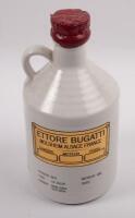 BUGATTI: Two items relating to Bugatti, a Bugatti event commemorative 750ml wine bottle presented to Bob King and also a decorative model of a 1930 Bugatti, 19cm long - 3