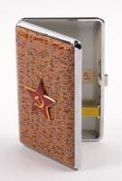 USSR: A Soviet CCCP cigarette case, showing the Soviet Union Red Star, Hammer and Sickle on Alligator style case. With &lsquo;CCCP 85&rsquo; sticker inside.