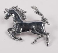 FERRARI: A Ferrari 'Prancing Horse' chromed pressed metal badge, 7cm high