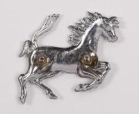 FERRARI: A Ferrari 'Prancing Horse' chromed pressed metal badge, 7cm high - 2