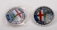 ALFA ROMEO: Two plastic round Alfa Romeo 'Milano' badges, each approx 5.7cm diameter.