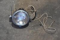 LAMP: A 6-inch Lucas headlamp complete with amp meter, switch and wiring. [Location: Sydney]