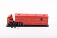 FERRARI TRANSPORTER: An approximate 1:43 scale Iveco semi trailer, race car transporter in Ferrari F1 livery