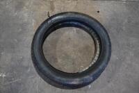 TYRES: A pair of Okada 26 x 3-inch NOS tyres, one still in original wrapping [Location: Sydney]