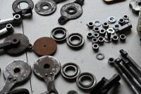 NORTON: Large quantity of Norton/Webb fork parts including headstocks, triple clamps, new bolts, headtock bearings, reconditioned side links, circa mid 1930s-1940s [Location: Sydney] - 7