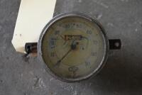 SPEEDOMETER: A Stewart-Warner 90mph speedo branded Ford [Location: Sydney]