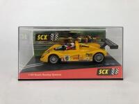 SCX: Two unused 1:32 scale SCX slot cars. Chevrolet and Ferrari - 2