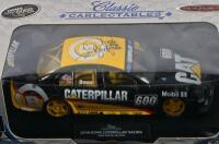 JOHN BOWE: A limited edition 1:18 scale Classic Carlectables Ford Falcon as raced by Bowe in 2000 Caterpillar Racing Falcon, roof signed by Bowe, with COA signed by Bowe numbered 2433/6000, in fitted box - 3