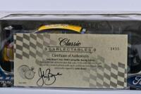 JOHN BOWE: A limited edition 1:18 scale Classic Carlectables Ford Falcon as raced by Bowe in 2000 Caterpillar Racing Falcon, roof signed by Bowe, with COA signed by Bowe numbered 2433/6000, in fitted box - 5