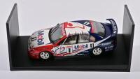 COMMODORE: A limited edition 1:18 scale Autoart Series Championship MHRT Commodore VT in 1999 raced by Craig Lowndes, with COA signed by Lowndes numbered 6148/7020, in fitted window box - 2